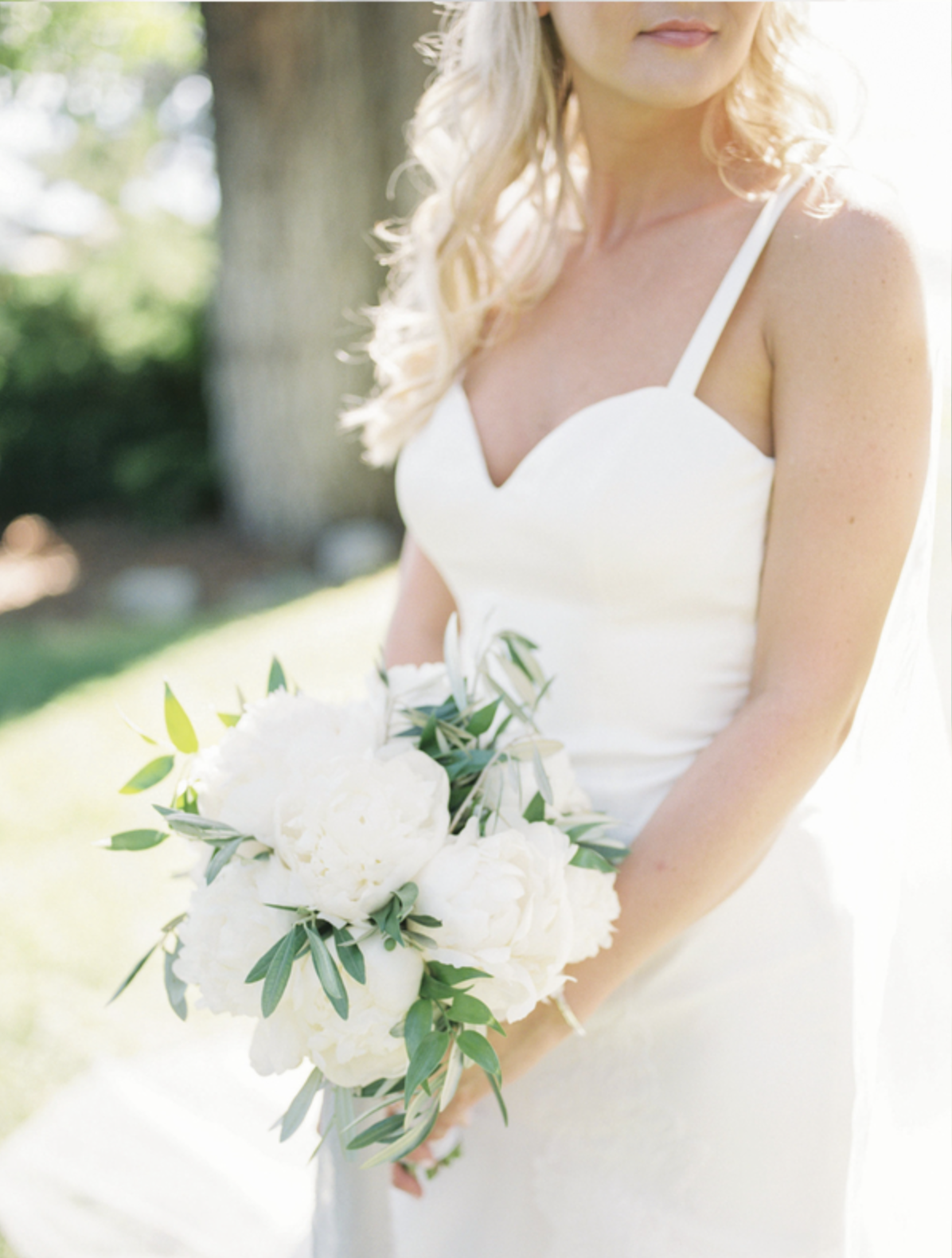 Bride with a white and green classic bouquet at the Hyatt in Lake Tahoe