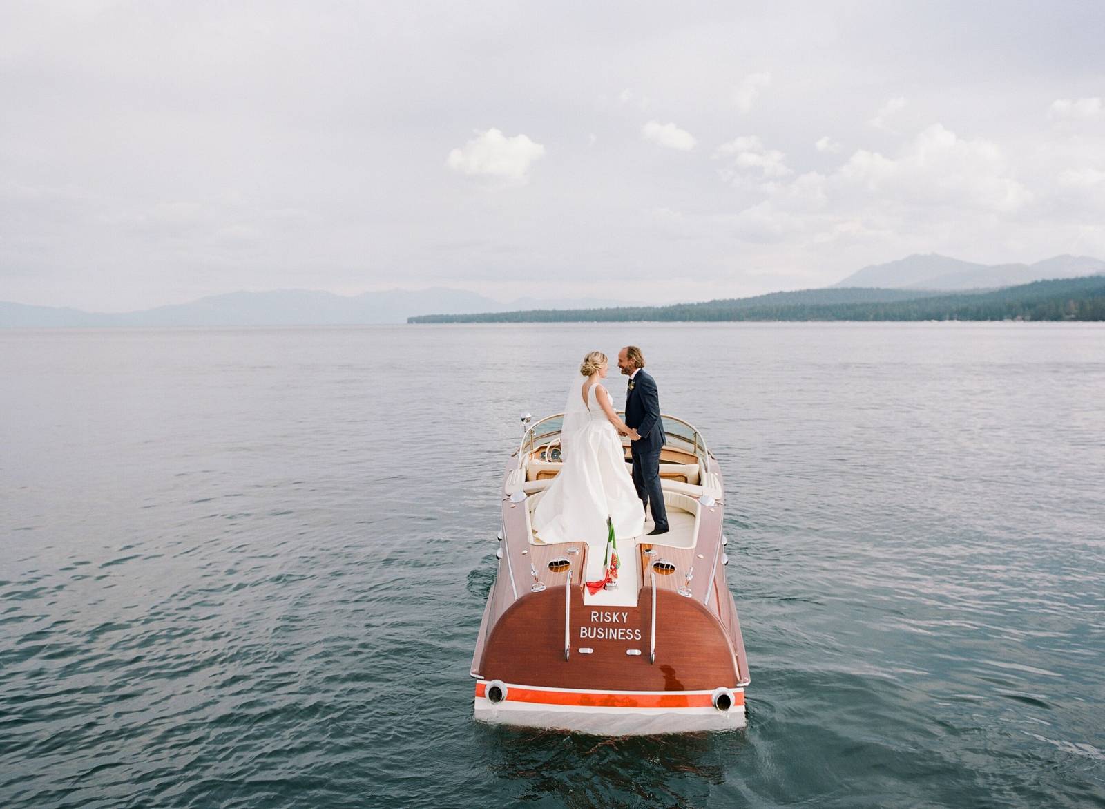 Lake tahoe wedding couple on a boat