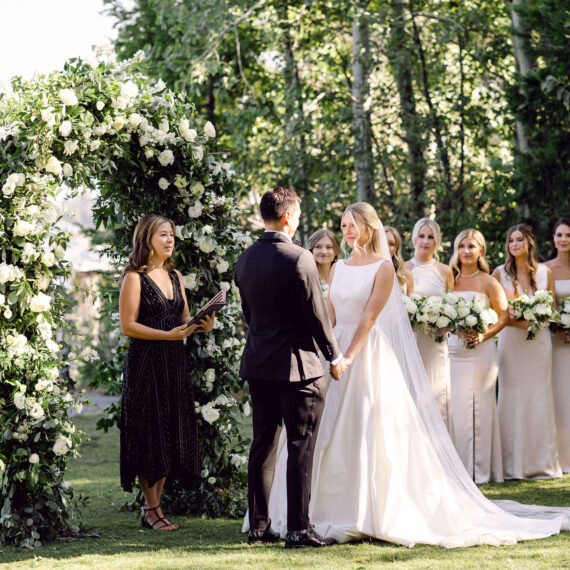 Wedding ceremony in Lake Tahoe with large floral arch
