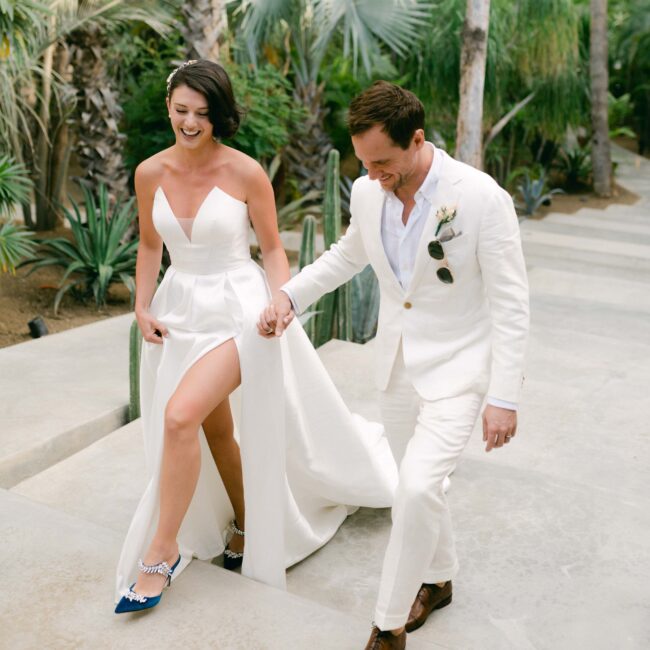A modern couple walks up the stairway with style for their Lake Tahoe wedding with Elsa Boscarello Photography