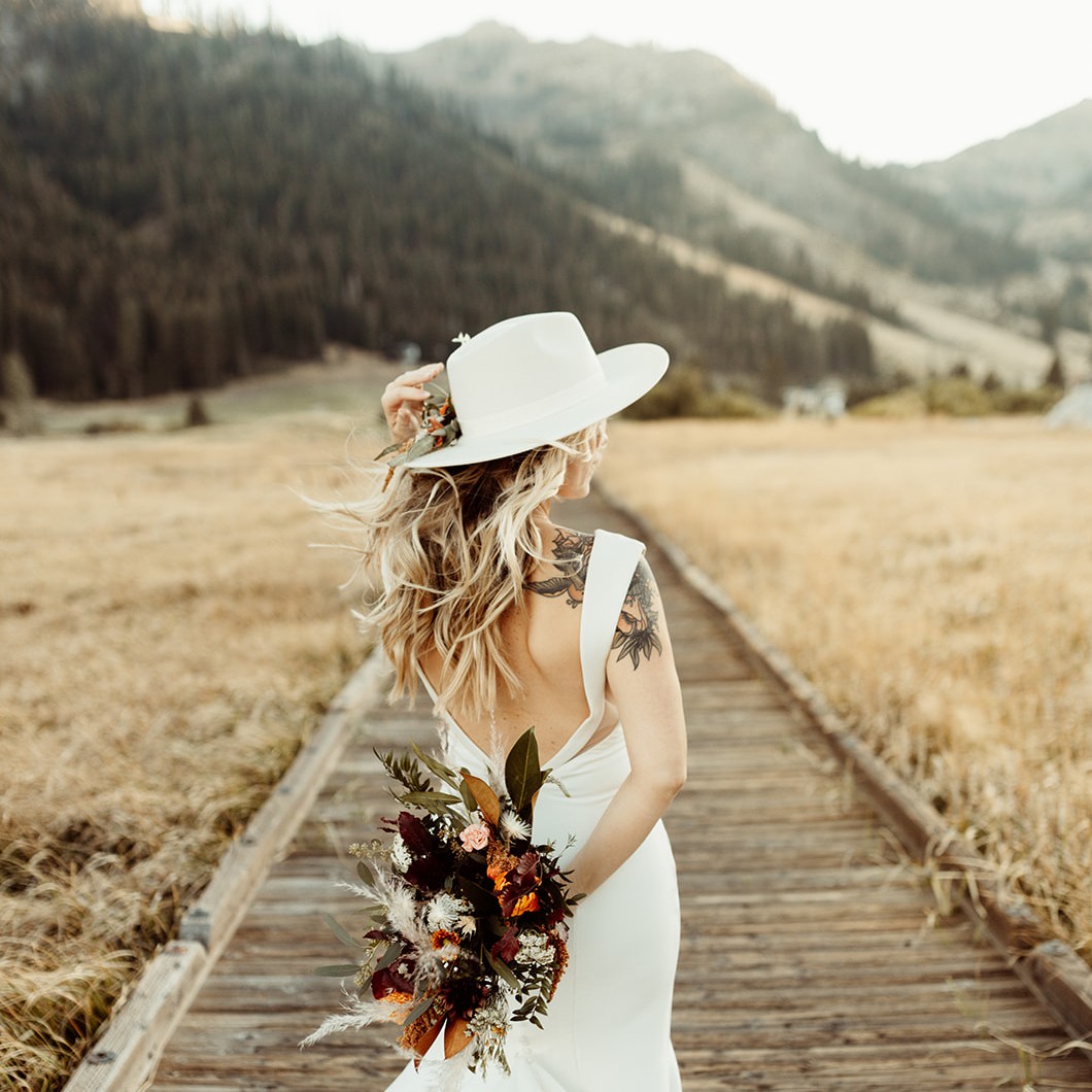 Boho bride overlooking the meadows in Lake Tahoe