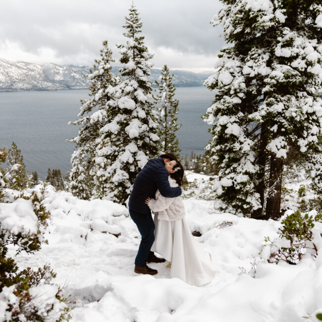 Bride, groom, snowy trees, lake tahoe
